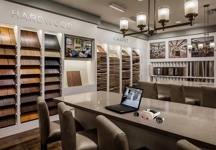 Virtual Design Center showroom with VR headset for collaborative property walkthroughs